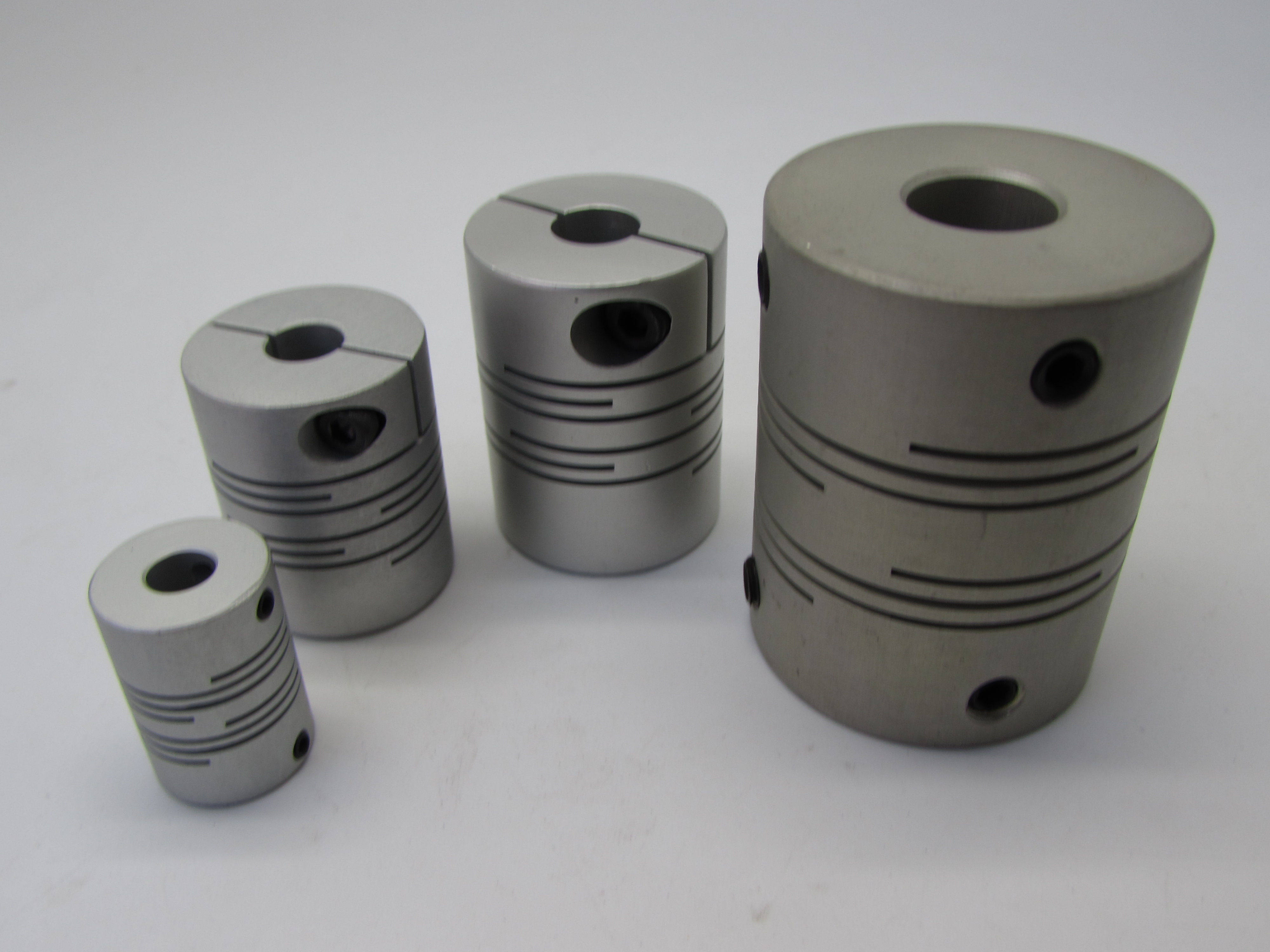 ALUMINUM FLEXIBLE COUPLING

(D17.50XL23)(5X5MM)

(D17.50XL23)(5X8MM)

(D17.50XL23)(6X6MM)

(D25XL31)(6.35X6.35MM)

(D16XL23)(6X6MM)

(D25XL31)(8X8MM)

(D30XL40)(9.5X9.5MM)

(D32XL40)(9.5X9.5MM)

(D30XL40)(12.7X12.7MM)

(D19XL25)(5X5MM)(B)

(D19XL25)(6.35X6.35MM)(B)

(D19XL25)(8X8MM)(B)